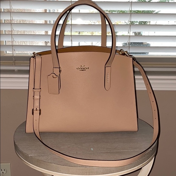 polished pebble leather charlie carryall